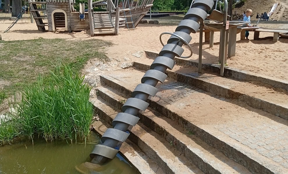Archimedes screw at Bahnweiher park in Pleinfeld, Bavaria, Germany by Cavaliere grande